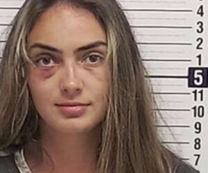 Girl Smirks For Police Snap After Having Ear Chomped Off In Catfight