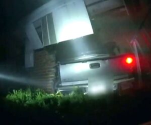 Officers Rescue Trapped Man After Truck Crashes into Home